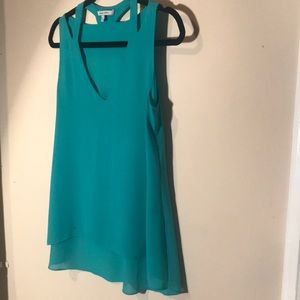 Turquoise blouse with neckline cutout detailing